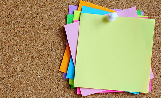 colorful-sticky-notes-on-cork-bulletin.png