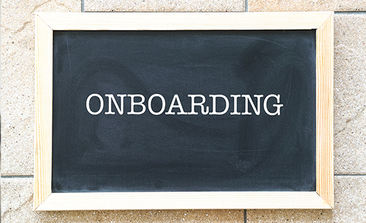onboarding-words-printed-on-blackboard-business