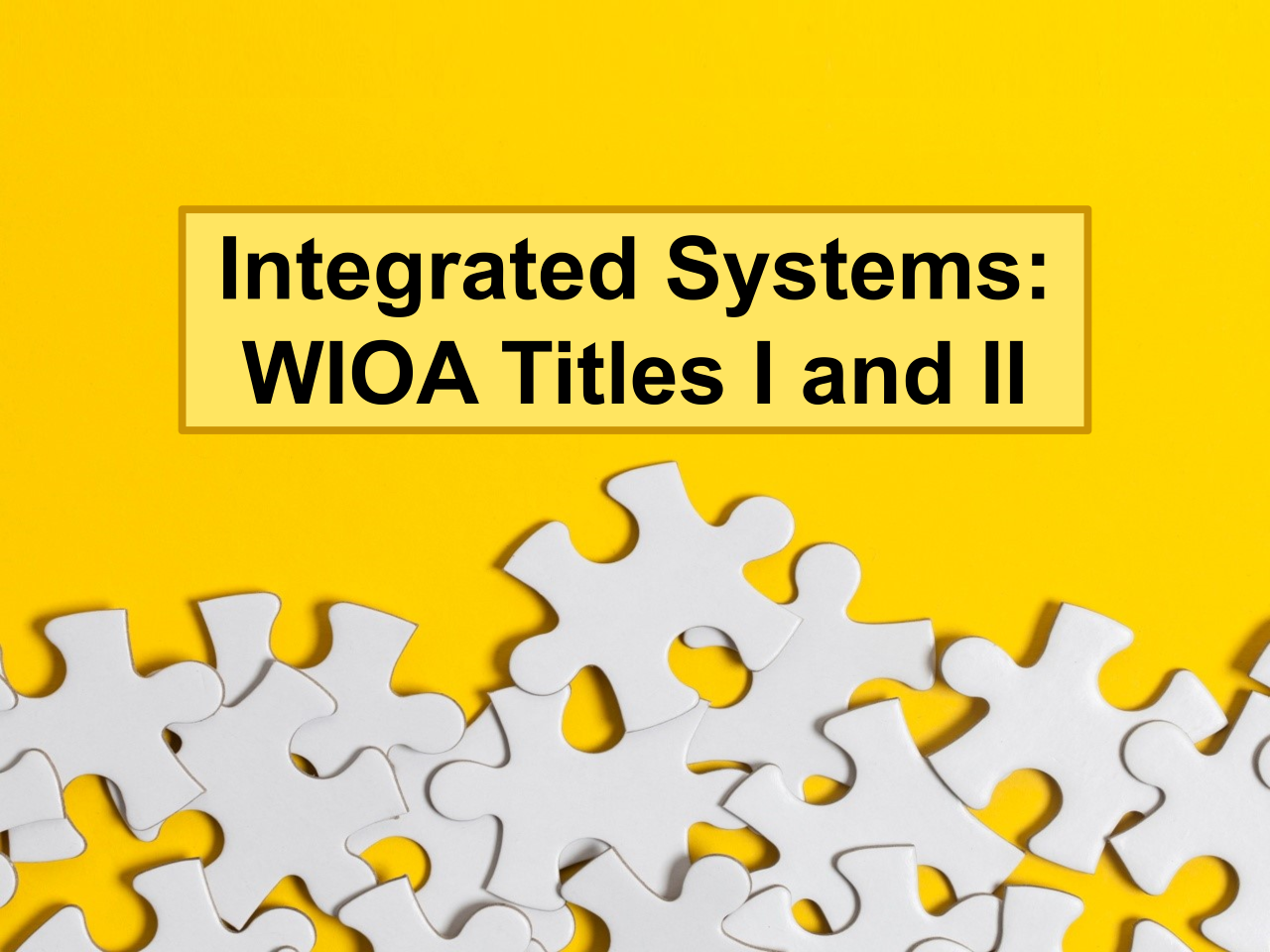 Puzzle pieces on a yellow background with text Integrated Systems WIOA Titles 1 and 2