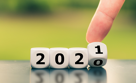 hand-turns-dice-changes-year-2020