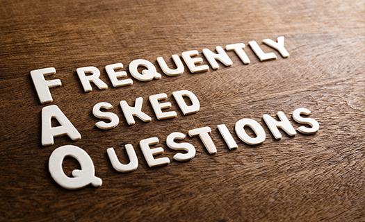 FAQ text by wood letters on wood texture.png