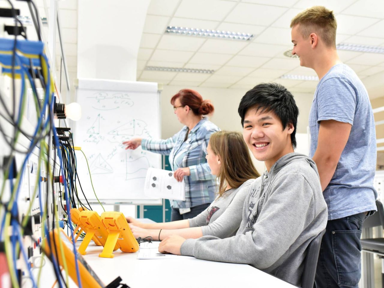Boy smiling while in CTE Classroom training
