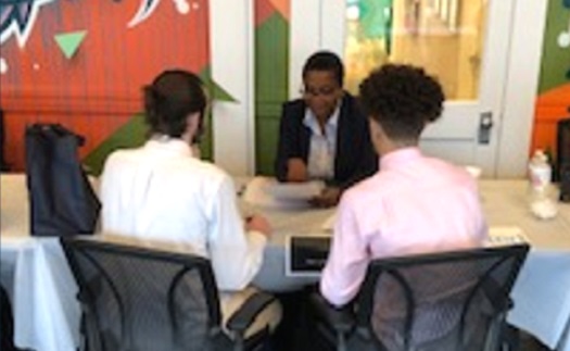 Students at Table with Job Developer