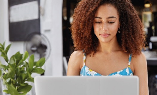 Women of Color working on laptop