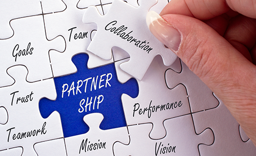 partnership-business-concept-female-hand-puzzle.png